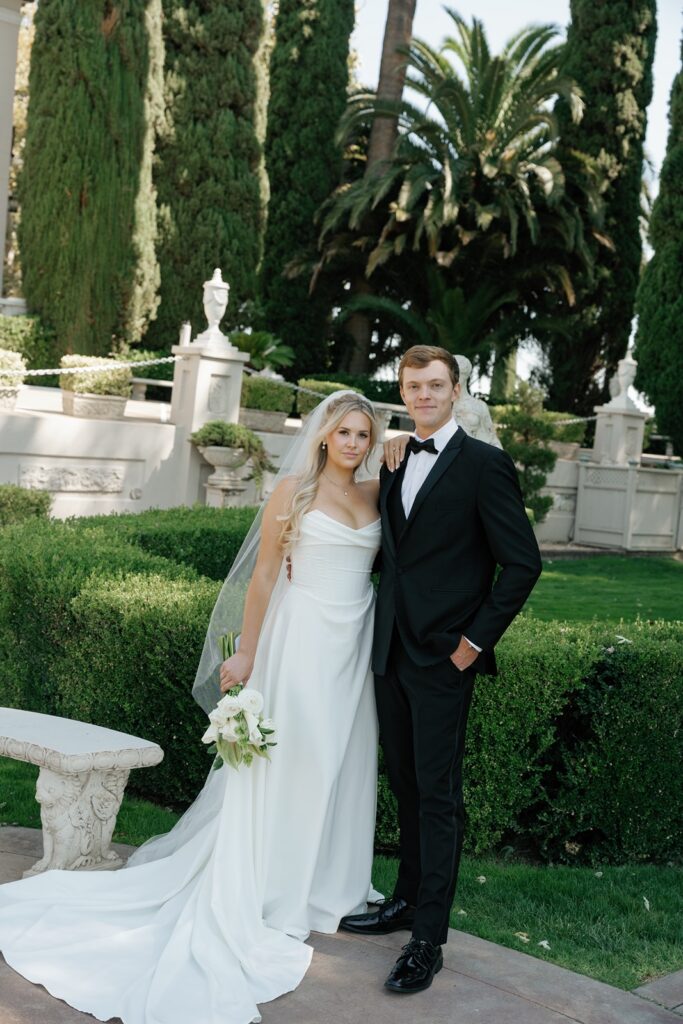 Bride and groom in the garden at their Grand Island Mansion wedding