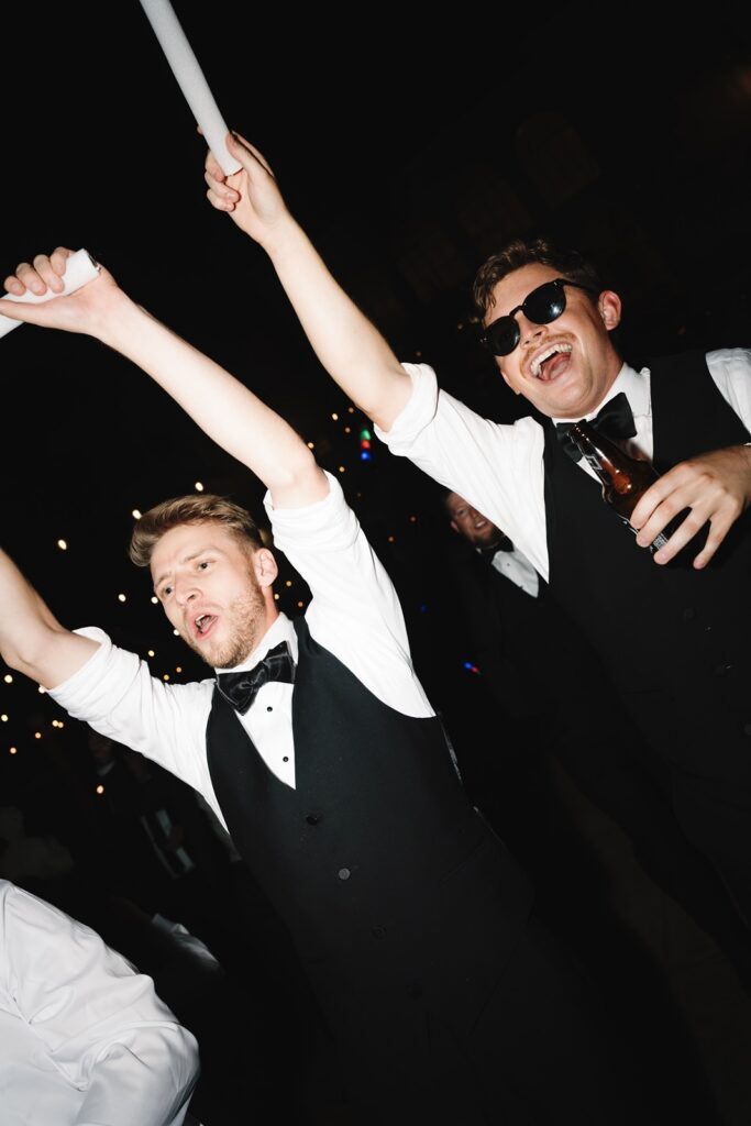 Guests dance at the Grand Island Mansion wedding reception