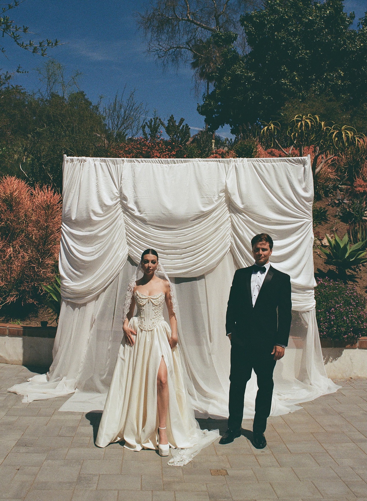 Bride and groom pose for portraits at Jeune Perche Estate