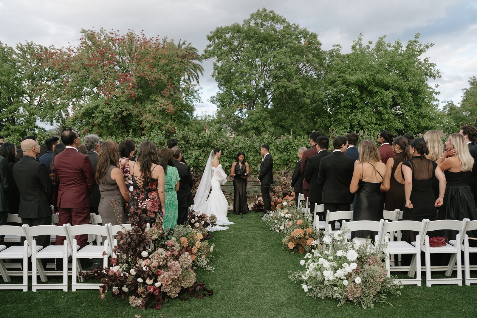 Bride and groom say vows at their wedding at The Estate Yountville