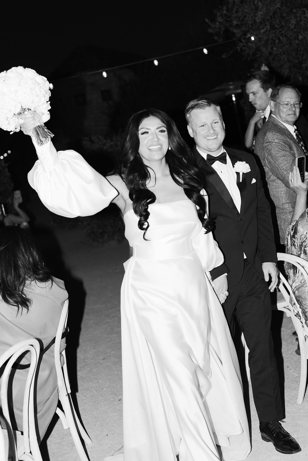 Bride and groom make entrance to their Allegretto Vineyard Resort wedding reception