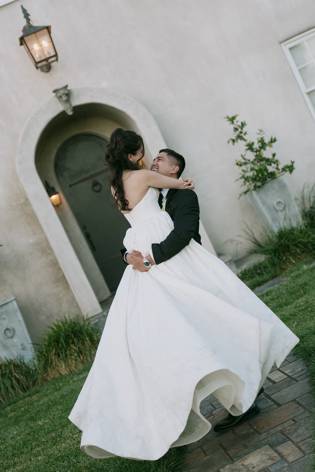 Groom picks up bride at their Cavaignac Estate wedding