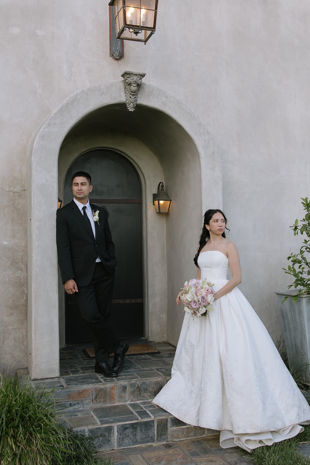Bride and groom in front of Cavaignac Estate