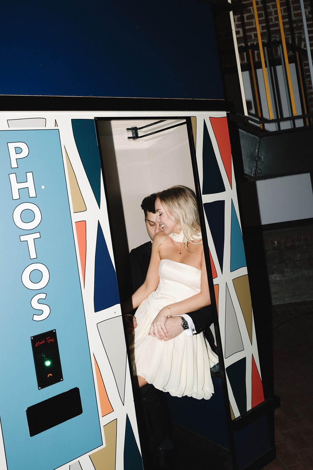 Couple in a Photo Booth during their San Francisco engagement shoot