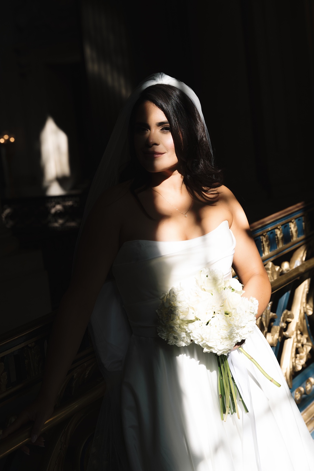 Bride with white bouquet at her San Francisco City Hall wedding