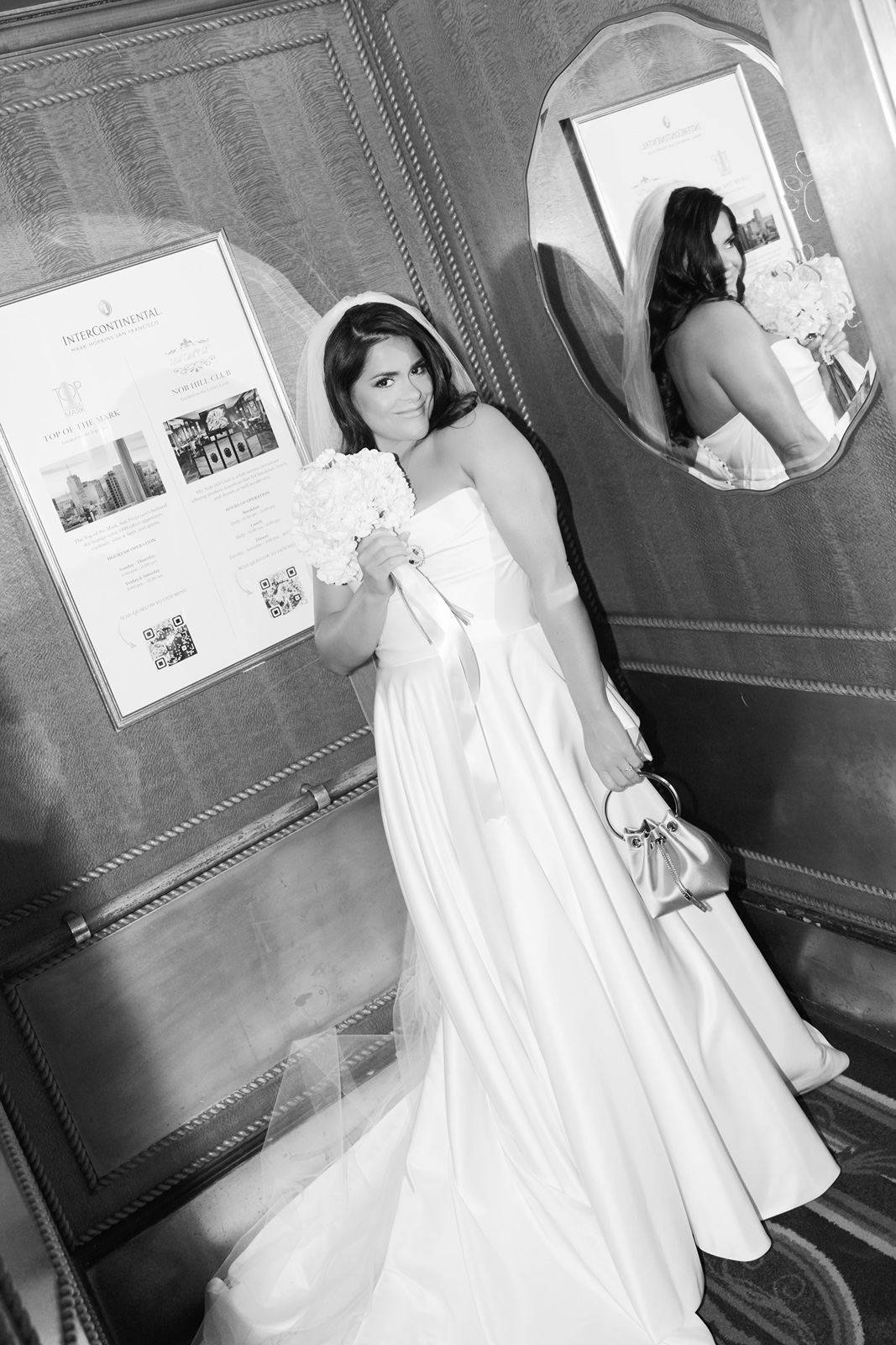 Bride in elevator before her San Francisco City Hall wedding