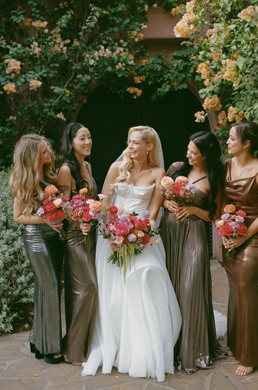 Bride with bridesmaids at the Sands Hotel & Spa wedding