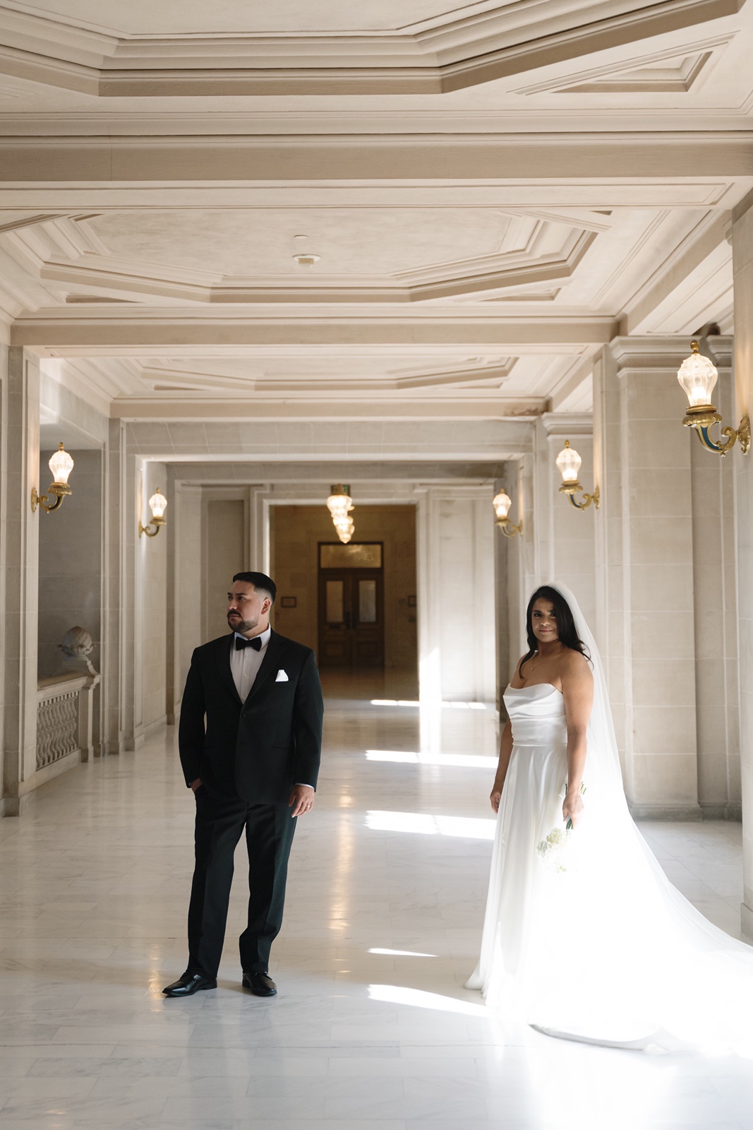Bride and groom inside San Francisco City Hall