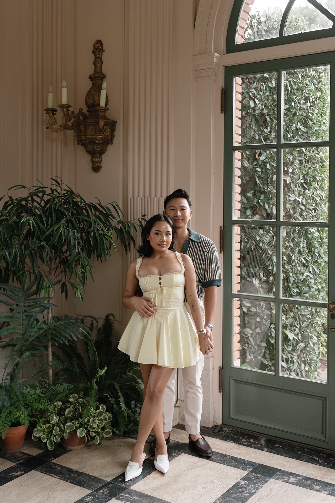 Man and woman pose for Filoli Gardens engagement photos