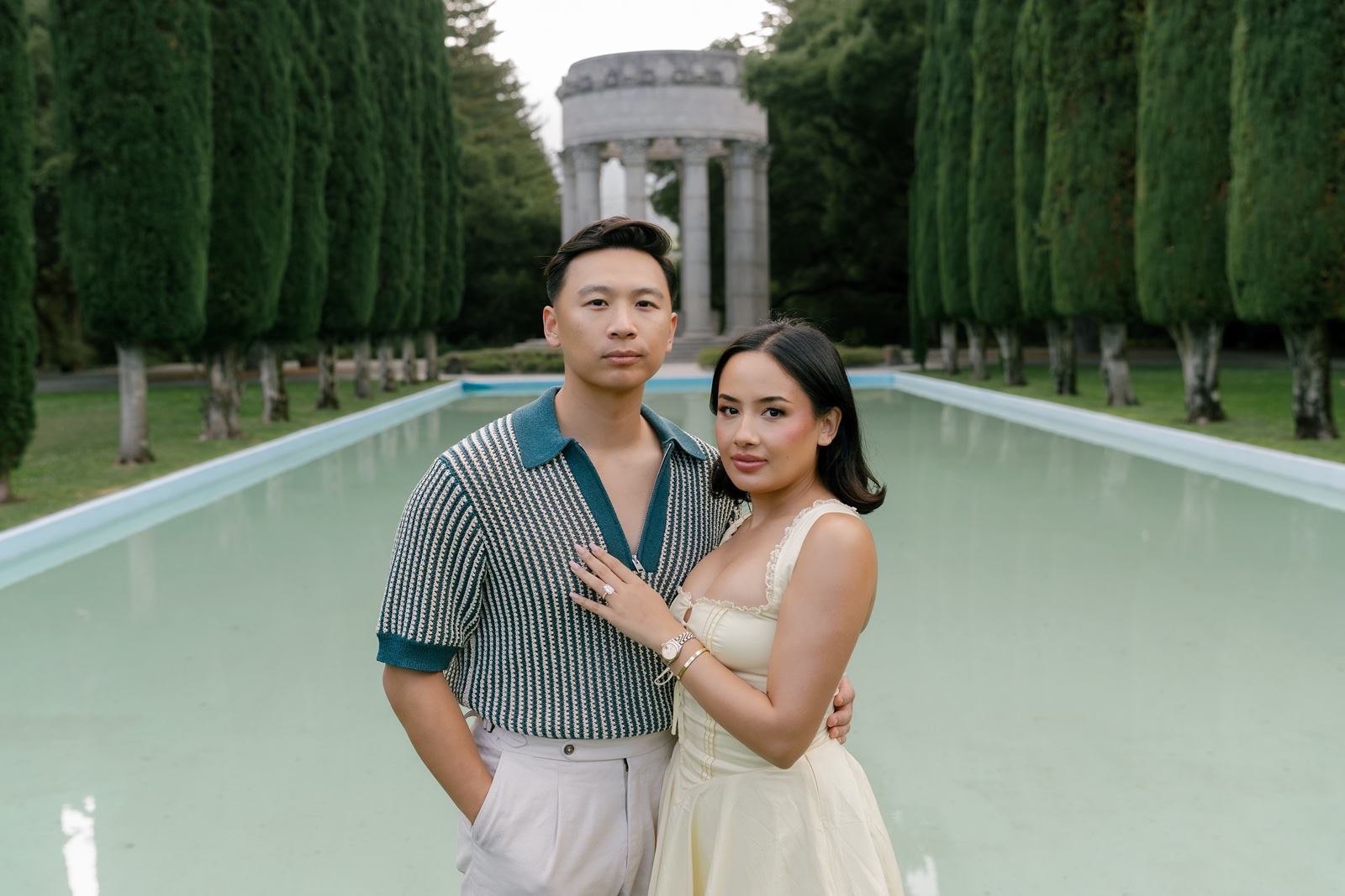 Couple smiles at camera during Filoli Gardens engagement photos