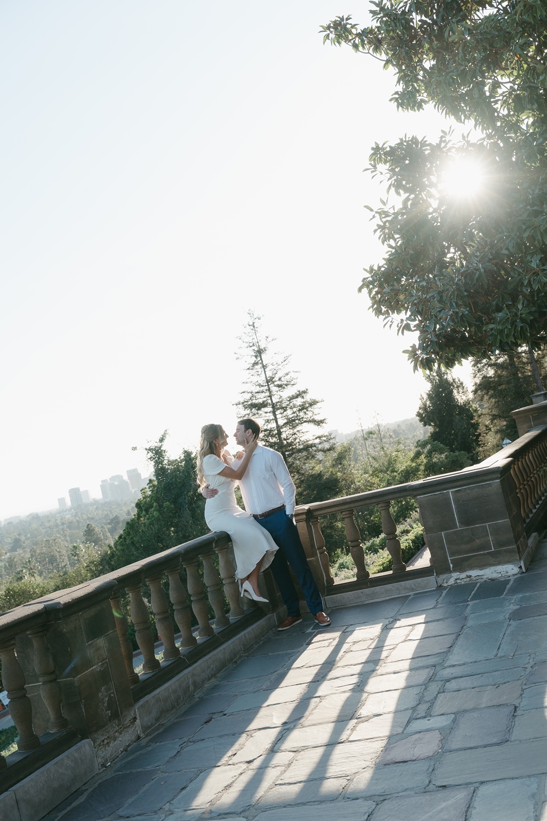 Couple embraces during Los Angeles engagement photoshoot