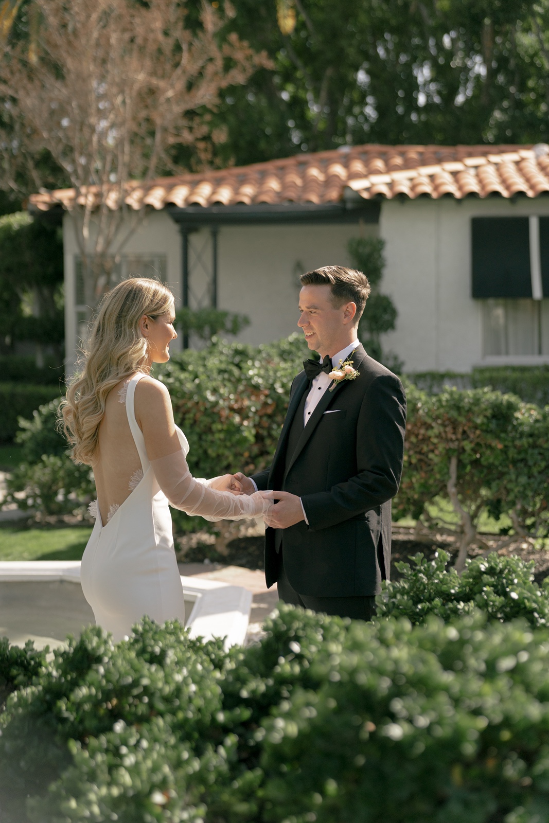Bride and groom have first look at their Avalon Hotel Palm Springs wedding