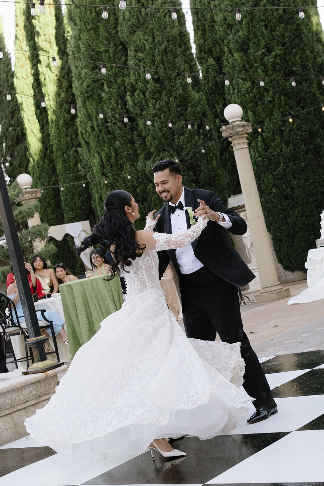 Couple shares romantic wedding first dance outdoors