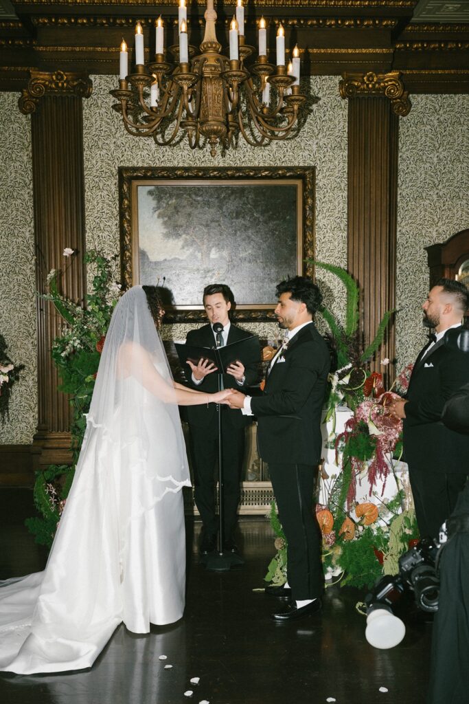 Bride and groom say vows at their University Club of San Francisco wedding ceremony
