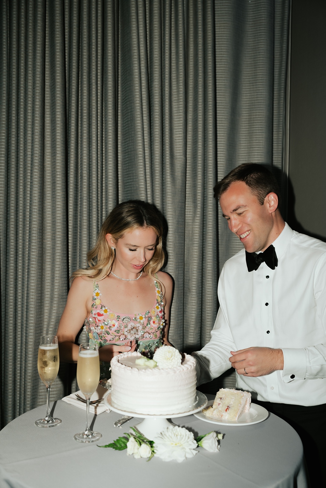 Bride and groom cut their wedding cake at the Carmel Valley Ranch wedding